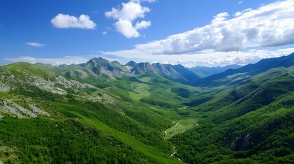 Fototapeta premium Serene mountain valley landscape with lush green vegetation and a clear blue sky, showcasing rolling hills and rocky peaks under a bright summer sun. : Generative AI