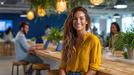 Fototapeta premium Modern office space, diverse coworkers, laptop collaboration, open kitchen area, yellow shirt, green blouse, smiling professionals, hanging pendant lights, 