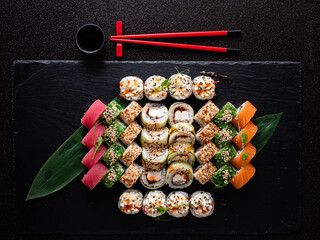 tasty sushi on the black background