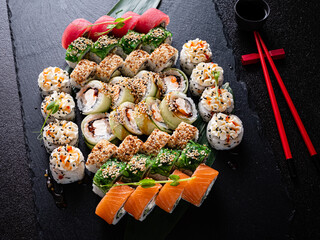 tasty sushi on the black background
