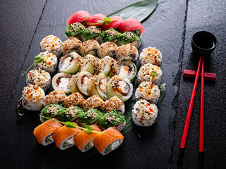 tasty sushi on the black background