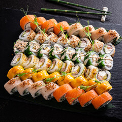 tasty sushi on the black background