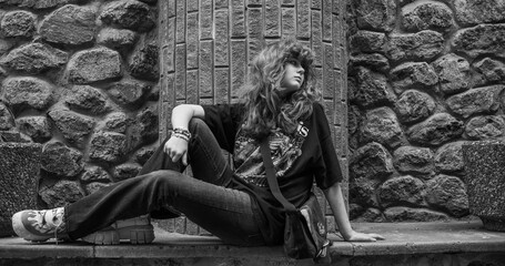 Teenage Girl in Denim Expressing Rebellion and Emotional Isolation