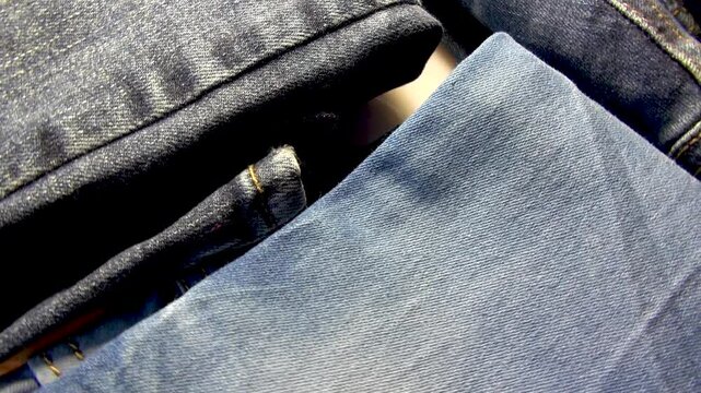 Different types of folded denim clothes