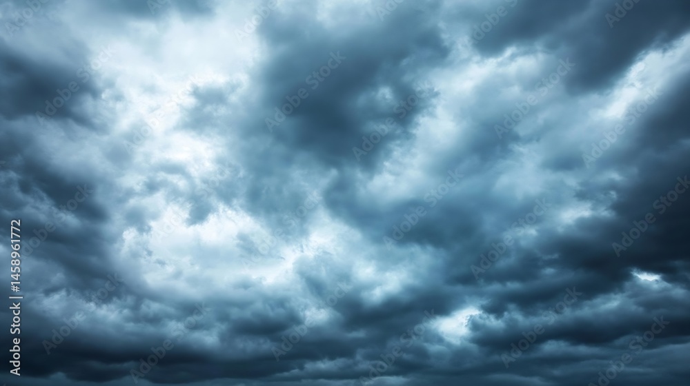 Aufkleber Dramatic dark grey storm clouds fill the sky, creating a moody and intense atmospheric scene.  Heavy cloud formations suggest impending rain or a powerful weather system. : Generative AI