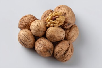 Pile of Walnut on Plain Background