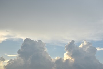 white and dark rain cloud floating on sky in evening