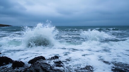 Dramatic ocean waves crashing against dark rocks on a cloudy day, creating a powerful display of nature's force and beauty. : Generative AI