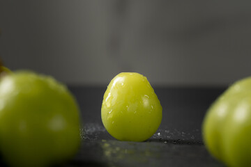 Close-up of grapes on table