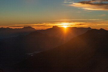 Sunset from Rocciamelone mountain peak in Graian Alps in Italy