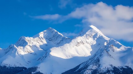 Obraz premium Majestic snow-capped mountain peaks rise against a vibrant blue sky, showcasing a breathtaking winter landscape. The sun illuminates the pristine snow, creating stunning shadows and t : Generative AI