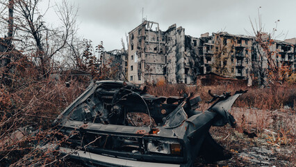 ruined street and destroyed houses in Ukraine