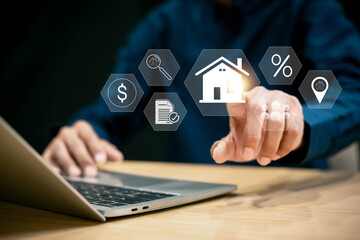 Real estate investment concept . Businessman use laptop with house icon for analyzing mortgage loan home and insurance real property mortgage. business real estate.