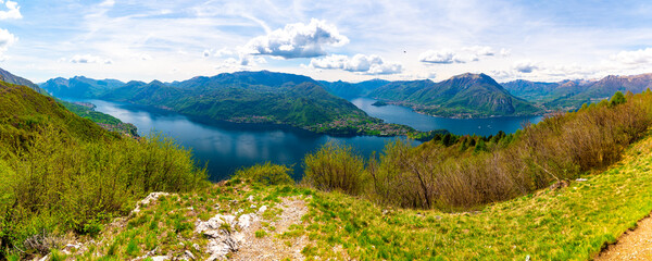 Panorama of Lake Como photographed from Ortanella, showing Bellagio, Balbianello, the Lecco and Como shores of the lake and the mountains above.