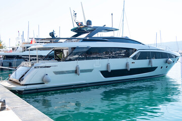 Fototapeta premium luxury private yacht, superyacht shipyards in Mediterranean Sea in marina, charter market, yachting industry, Bay Kotor, Tivat Bay