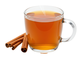 Spiced tea in a clear glass mug accented by cinnamon sticks against black
