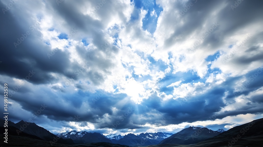 Poster Dramatic cloudscape over a snow-capped mountain range, sun rays breaking through the dark clouds, creating a breathtaking natural scene. : Generative AI