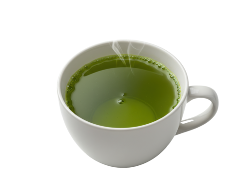 Steaming matcha tea in a white cup against a black backdrop