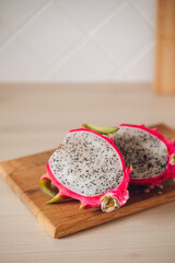 pitahaya dragon fruit on a board in the kitchen