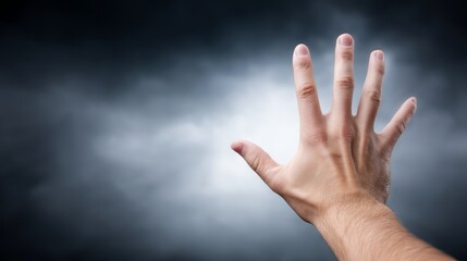 A hand emerges from dark mist, extending toward a faint light in the distance, symbolizing emotional struggle and the desire for hope amidst fear