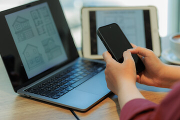 Confident professionals discussing architectural plans or real estate projects in a collaborative workplace — ideal for themes of teamwork, project planning, and corporate innovation.