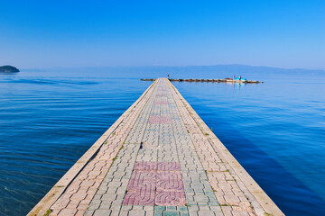 Lake Ohrid, North Macedonia, April 13 2024. Mountain range and peninsula in distance. Ohrid Lake,...