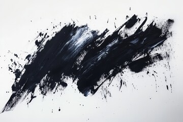 Abstract monochrome paint splatter on a light background.