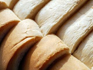 Fresh brown bread Top view, texture of fragrant bread background with brown bread edges macro food
