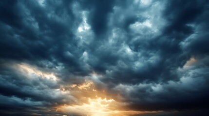 Dramatic storm cloudscape at sunset, showcasing a breathtaking contrast of dark, brooding clouds and a vibrant, golden light breaking through from below. : Generative AI