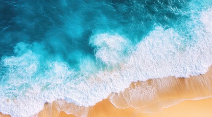Fototapeta premium Aerial view of turquoise ocean waves crashing on a sandy beach (1)