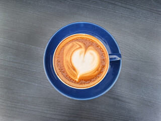 Top view of a latte art coffee beverage.