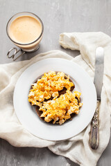 scramble eggs with black bread on dish