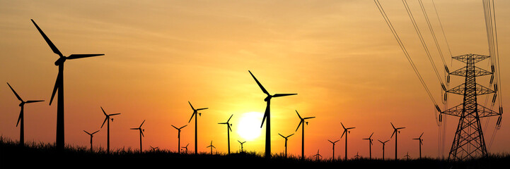 Wind Turbines at Sunset: Against the backdrop of a vivid sunset, a cluster of wind turbines stands...