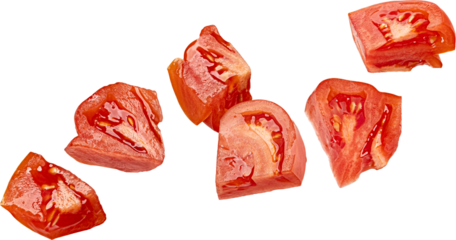 Falling chopped tomatoes isolated on white background with clipping path
