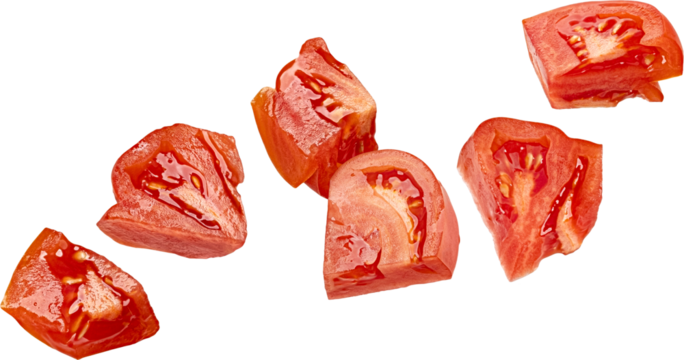 Falling chopped tomatoes isolated on white background with clipping path