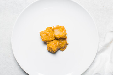 Overhead view of nigerian yam porridge, top view of nigerian asaro on a white backgroundOverhead view of nigerian yam porridge, top view of nigerian asaro on a white background