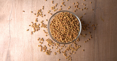 Methi or fenugreek seeds with methi leaves.Methi seeds is good for health.
