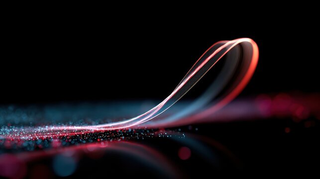 Abstract light painting with red and blue trails on dark backdrop