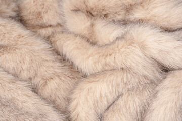 Texture of faux fur as a background, top view.