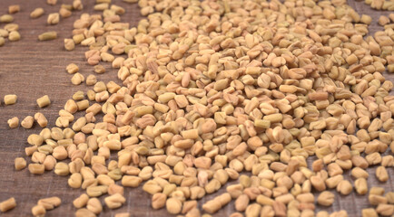 Methi or fenugreek seeds with methi leaves.Methi seeds is good for health.
