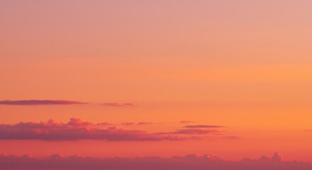 Orange And Pink Sunset Sky With Soft Clouds