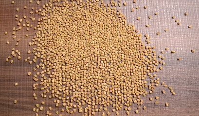 Methi or fenugreek seeds with methi leaves.Methi seeds is good for health.
