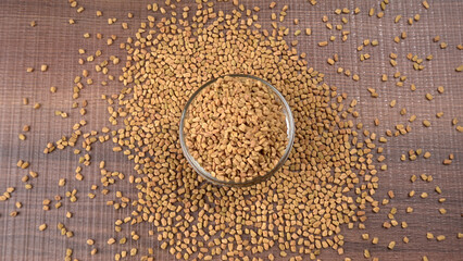 Methi or fenugreek seeds with methi leaves.Methi seeds is good for health.
