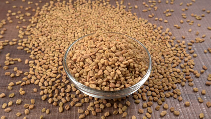 Methi or fenugreek seeds with methi leaves.Methi seeds is good for health.
