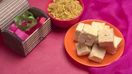 Patisa / Soan Papdi is a popular Indian cube shape flaky/crispy dessert. 
