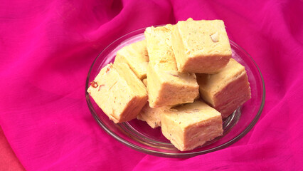 Patisa / Soan Papdi is a popular Indian cube shape flaky/crispy dessert. 
