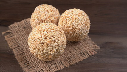 Amarnath seed, Cholai or Rajgira laddo, Also in cube shape called chikki or cake form, Indian sweet and healthy food served in a plate and bowl. Selective focus.