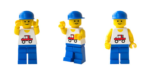 Obraz premium Figura de mecánico de LEGO oficial. Tres posturas. Imagen aislada