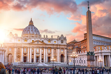Vatican City Holy( See). Rome, Italy. Dome of St. Peters Basil cathedral at Saint Square. Evening sunset, golden hour with evening sky and street lamps.