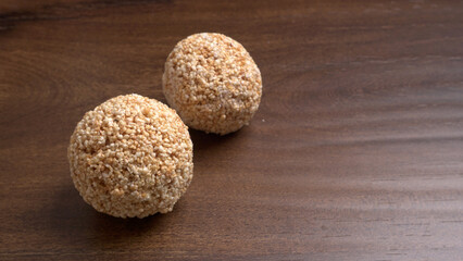 Amarnath seed, Cholai or Rajgira laddo, Also in cube shape called chikki or cake form, Indian sweet and healthy food served in a plate and bowl. Selective focus.